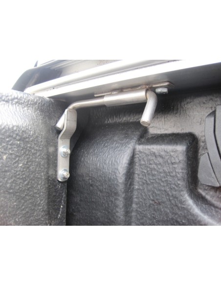 Sistema di bloccaggio per copertura cassone avvolgibile