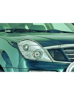 Coppia protezioni fari anteriori acciaio inox SsangYong Rexton fino al 2004