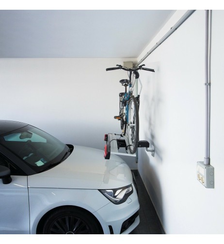 Supporto a parete universale per portabiciclette posteriori a gancio traino